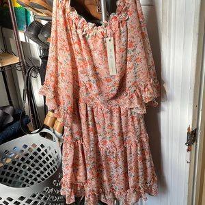 Never worn off the shoulder dress